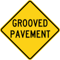 Grooved pavement road sign (MUTCD W8-15)
