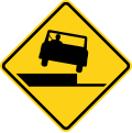 Right shoulder drop-off ahead road sign (MUTCD W8-17R)